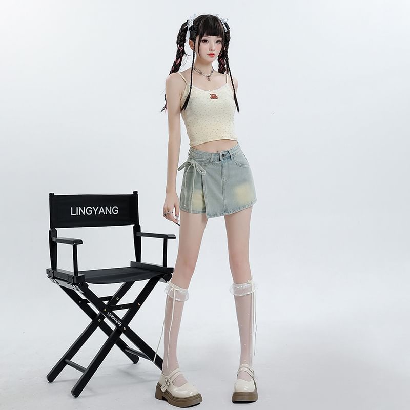 Denimot - Hoge taille asymmetrische gewassen mini A-lijn denim skort met strik aan de zijkant
