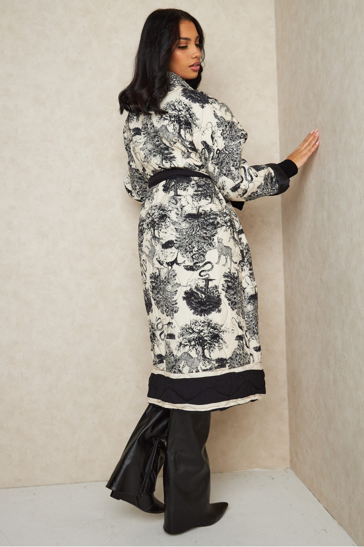 Veste longue matelassée noir et beige à motif jungle
