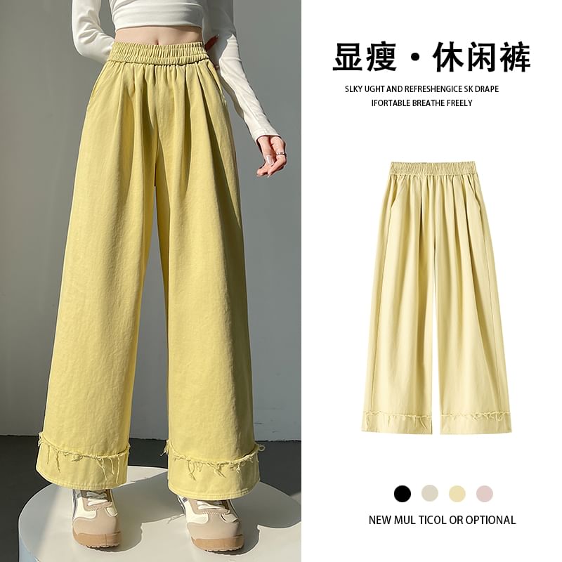 Tel tot 10 - Elastische taille, effen wijde broek