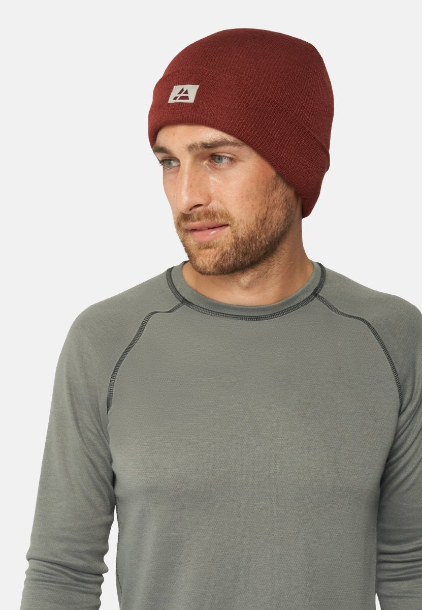 HUE MED FLEECE AF GENANVENDTE MATERIALER