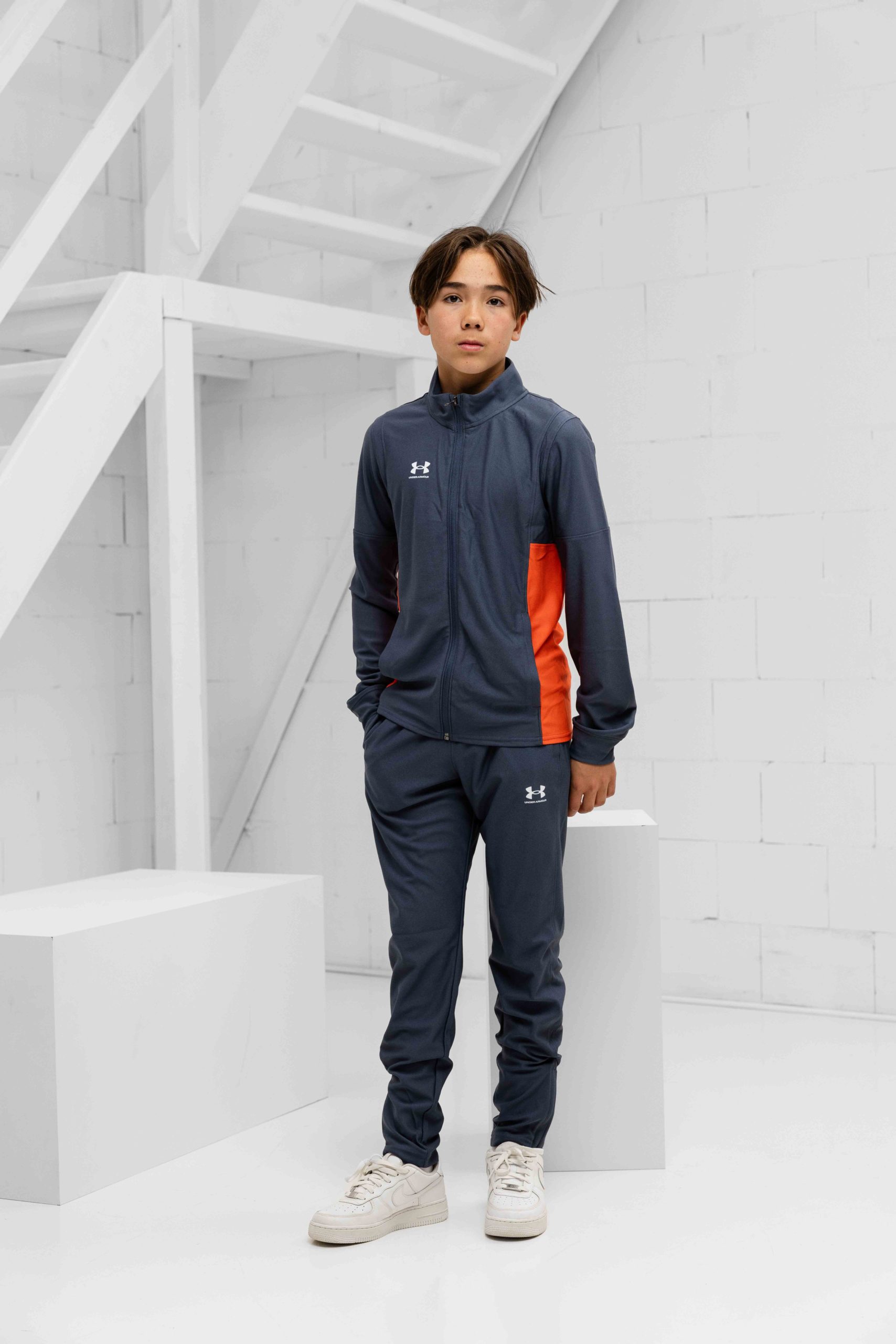 Under Armour Challenger Trainingspak Kids Donkergrijs/Oranje