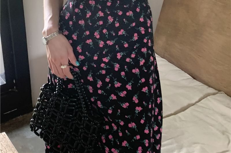 Brigitte - Mouwloze V-hals maxi-A-lijnjurk met bloemenprint en ruches