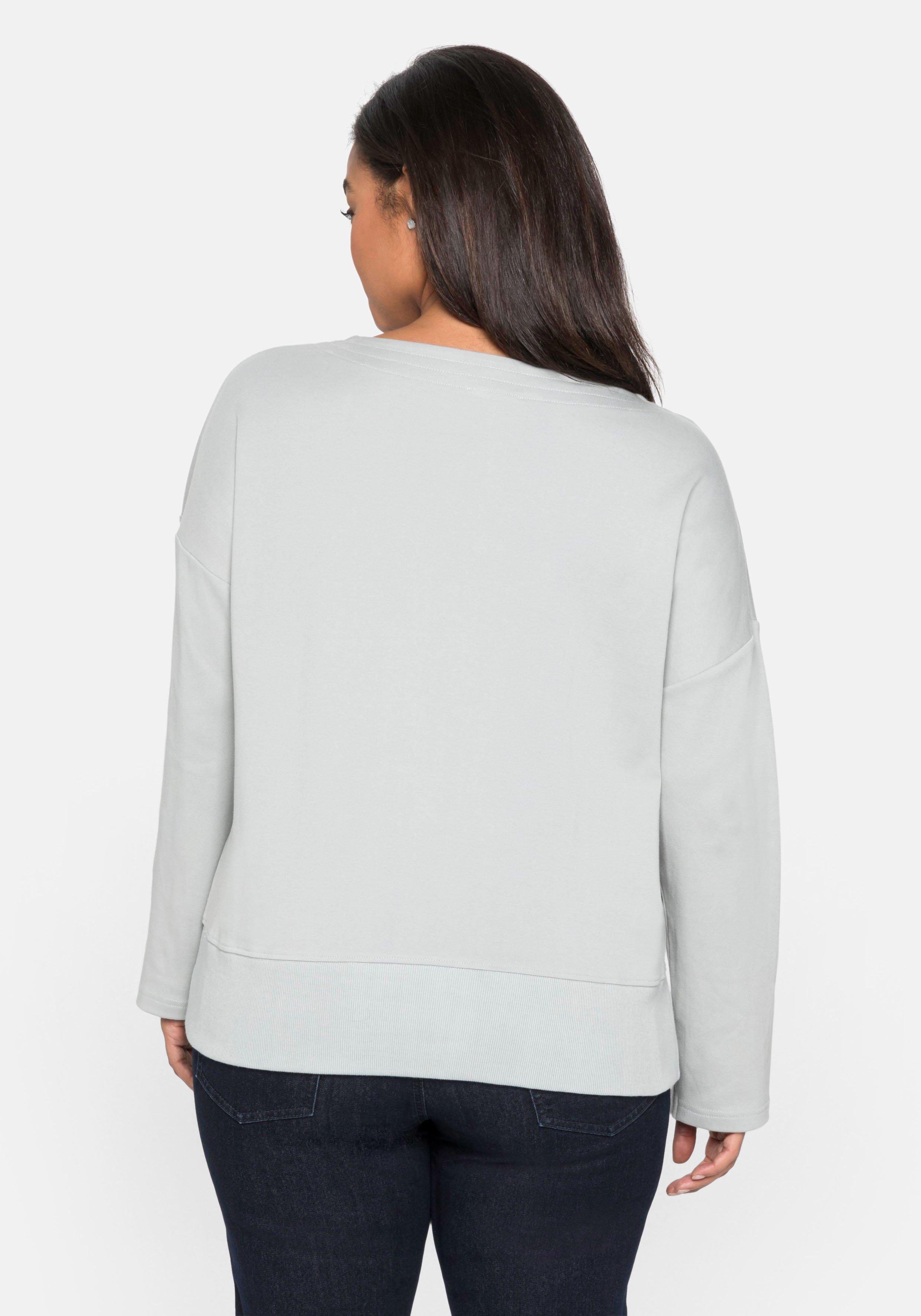 Langarmshirt mit Rippbund am Saum und Ziernähten