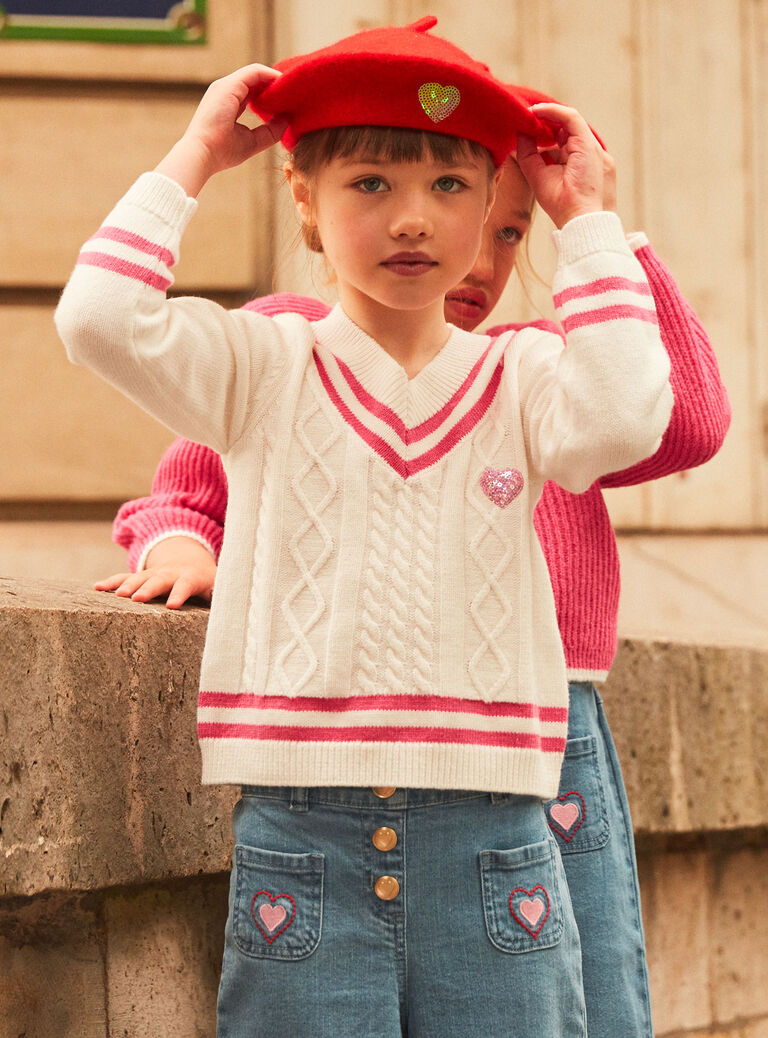 Pull écru en maille torsadée