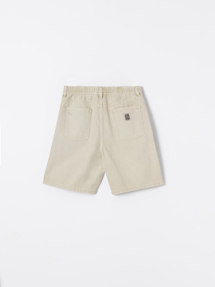 Bermuda jeans com rasgos - Bege claro