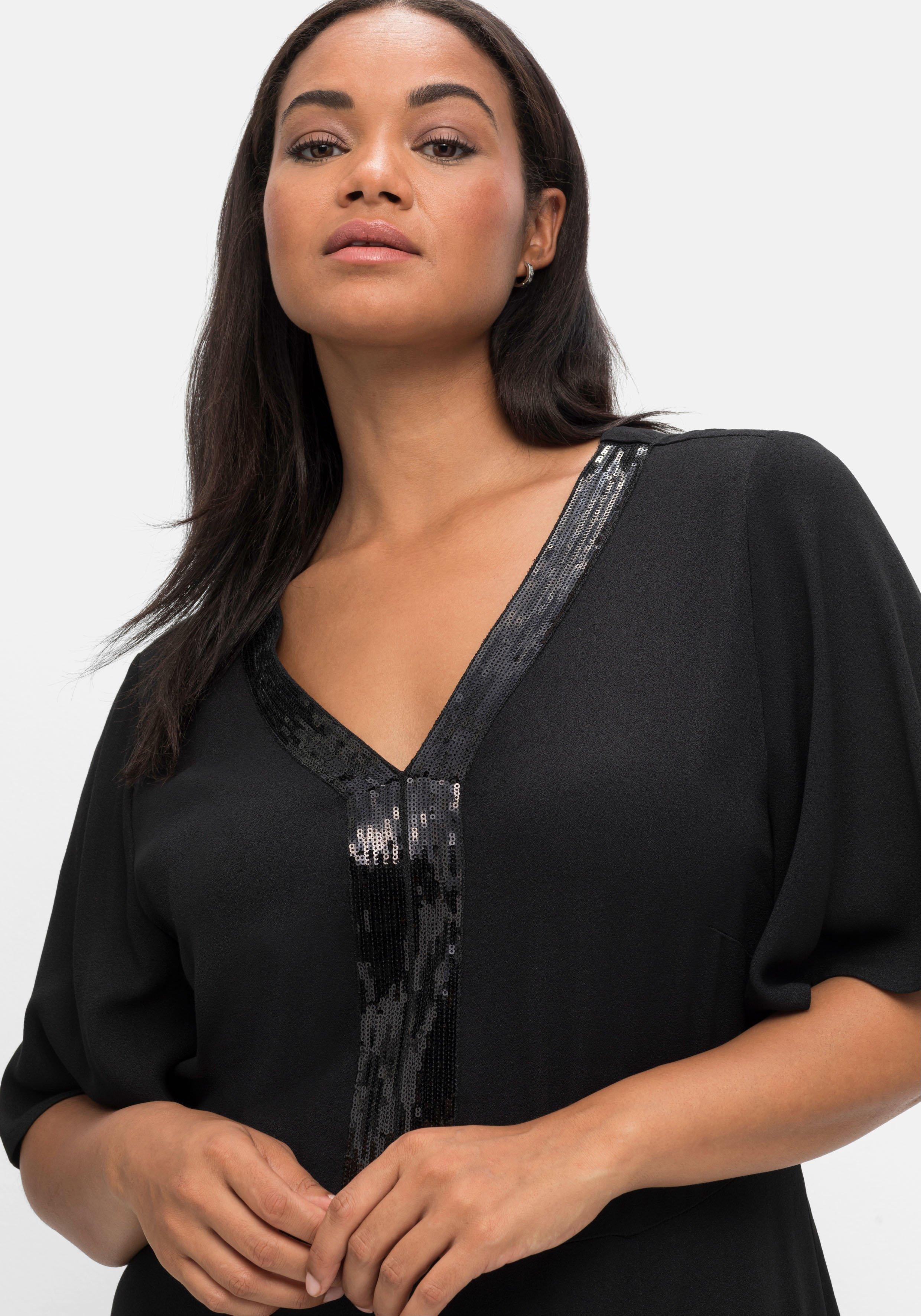 Abendkleid mit Pailletten am V-Ausschnitt