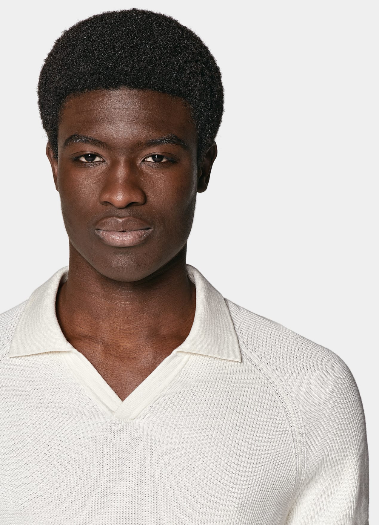 Polo sans boutons côtelé blanc cassé