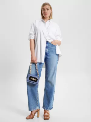 Calça jeans desbotada de cintura alta, corte reto e modelagem relaxada.