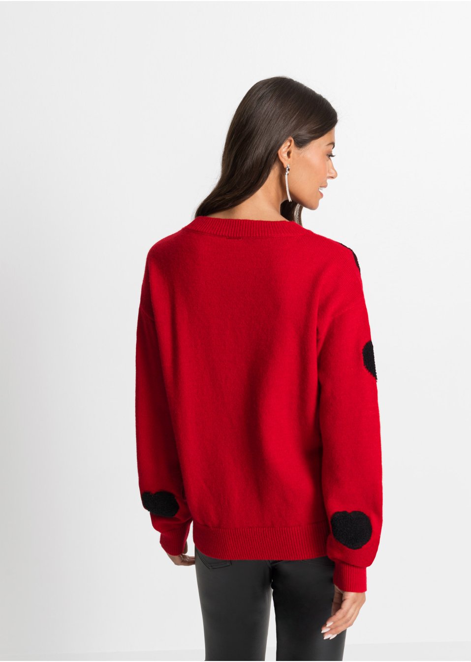 Pull avec éléments décoratifs appliqués