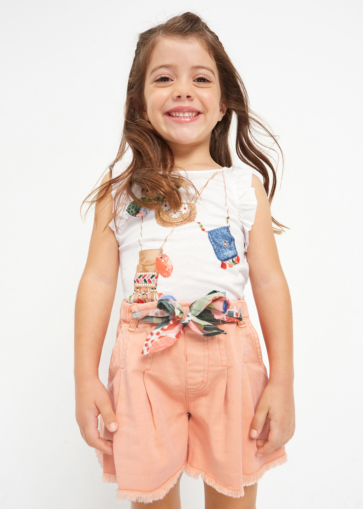 Calções de algodão estampados para meninas com cinto, feitos de algodão sustentável.