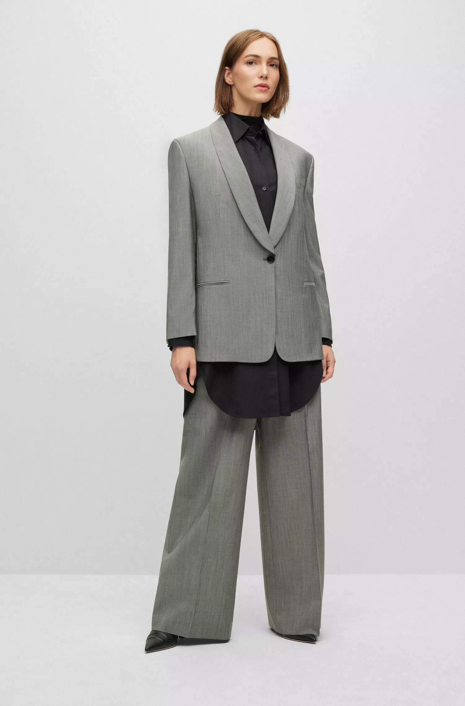 Calças BOSS pretas de corte oversized em lã virgem e mohair.