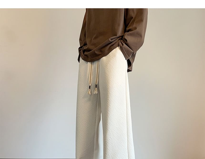 AXEN - Rechte broek met trekkoord in de taille, effen letters en reliëf