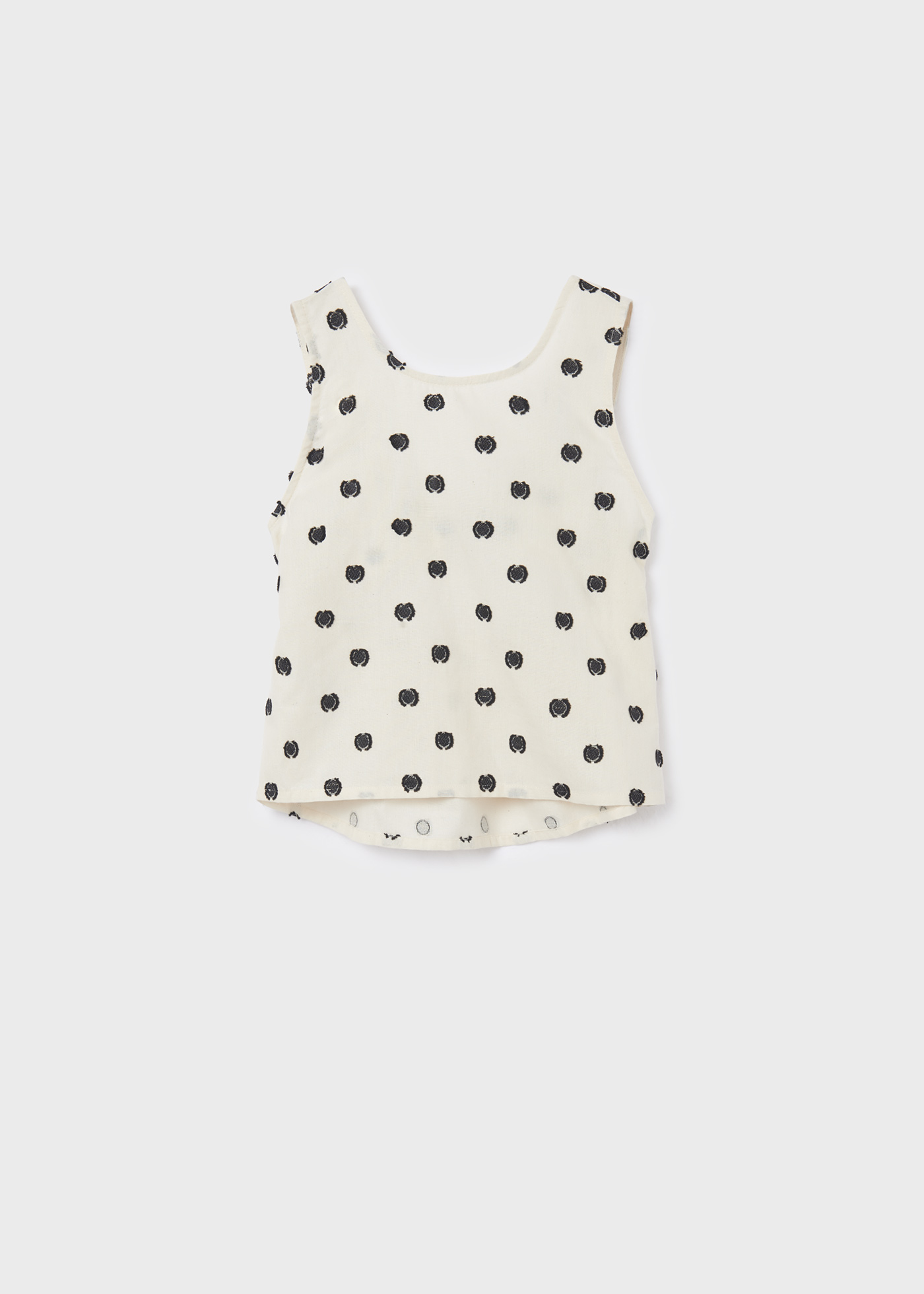 Blusa de bolinhas com laço para menina