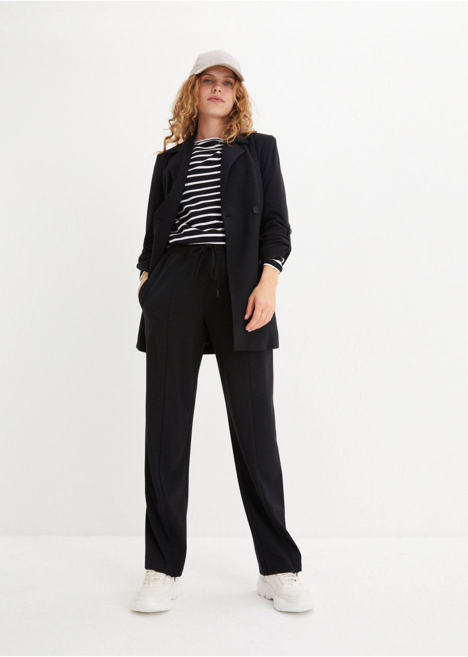 Pantalon en Punto di Roma avec fente zippée