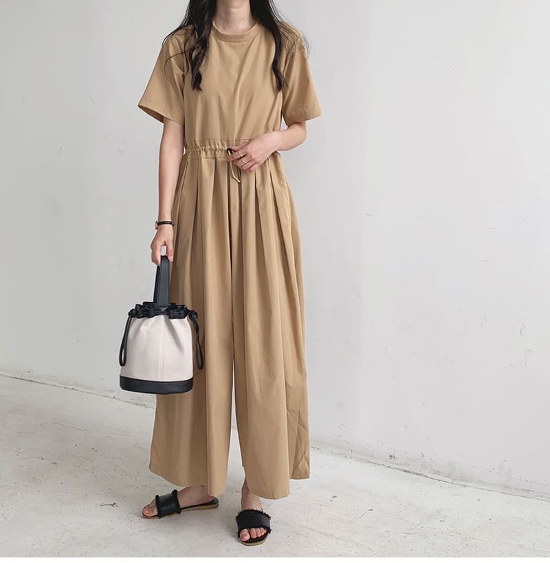 Bakli - Jumpsuit met korte mouwen, ronde hals, effen cropped en wijde pijpen