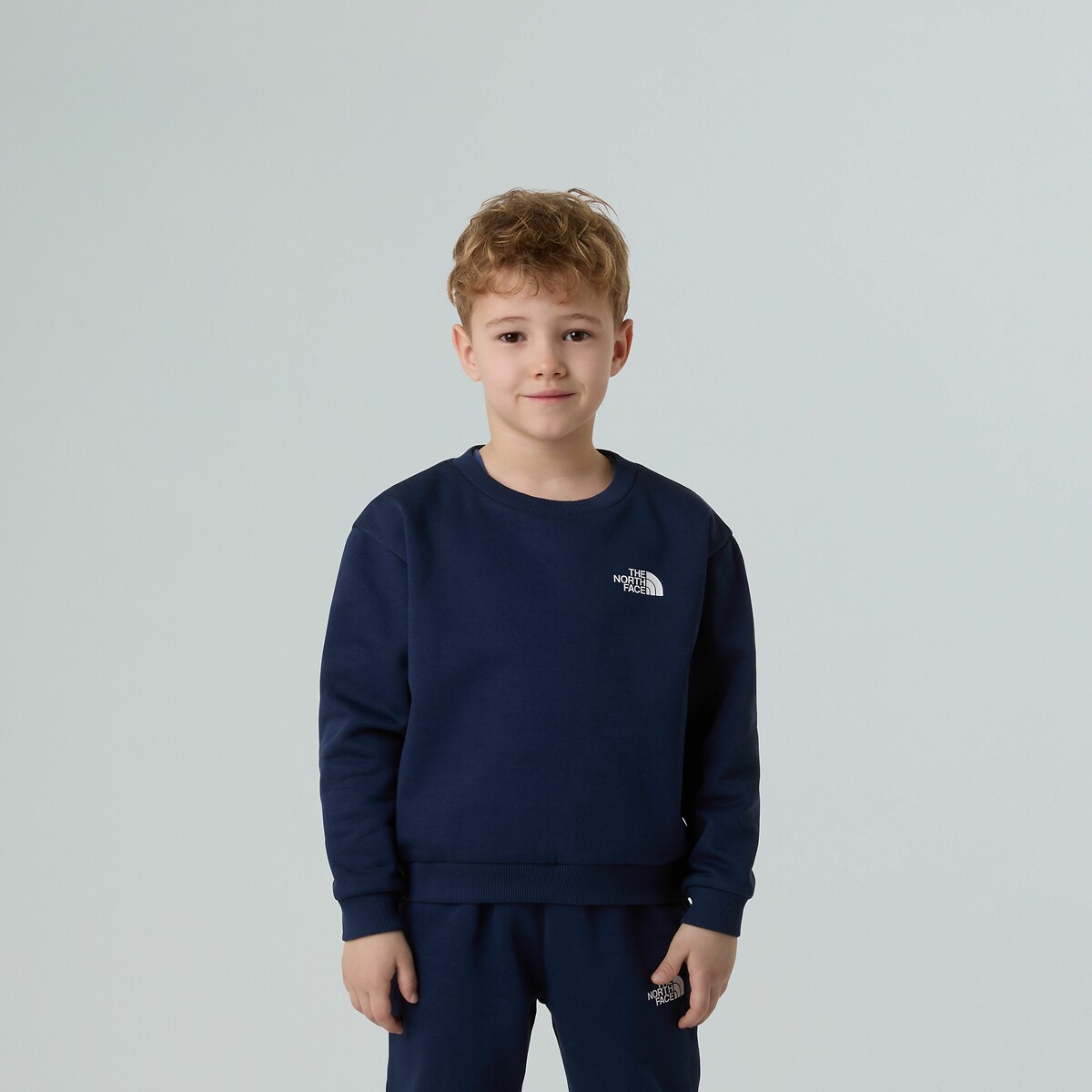 THE NORTH FACE<br>Treino com suéter + broek em molton