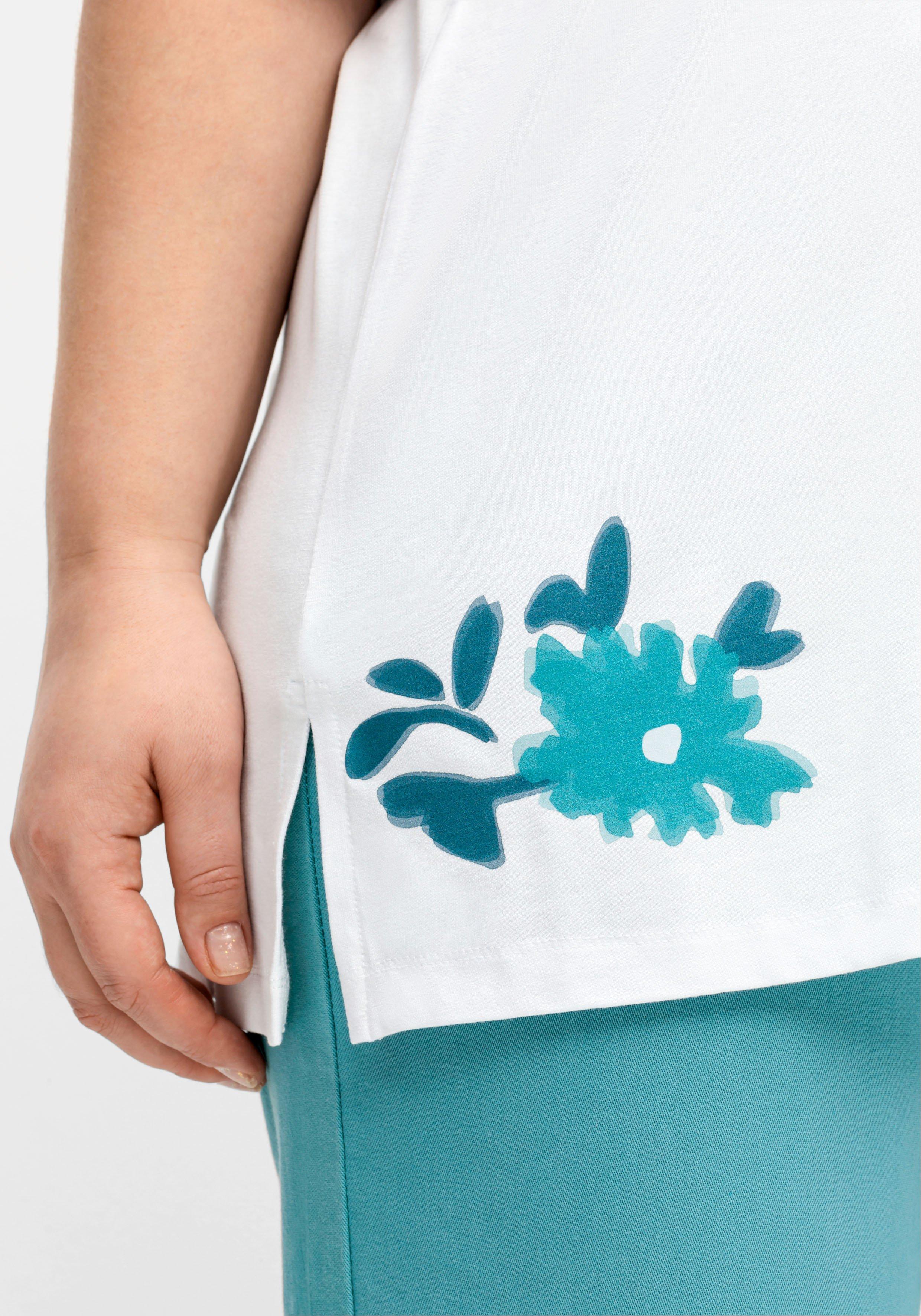 Shirt mit Blütenprint am Saum