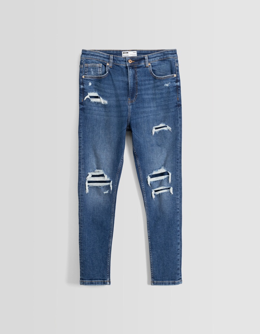 calça jeans cenoura rasgada