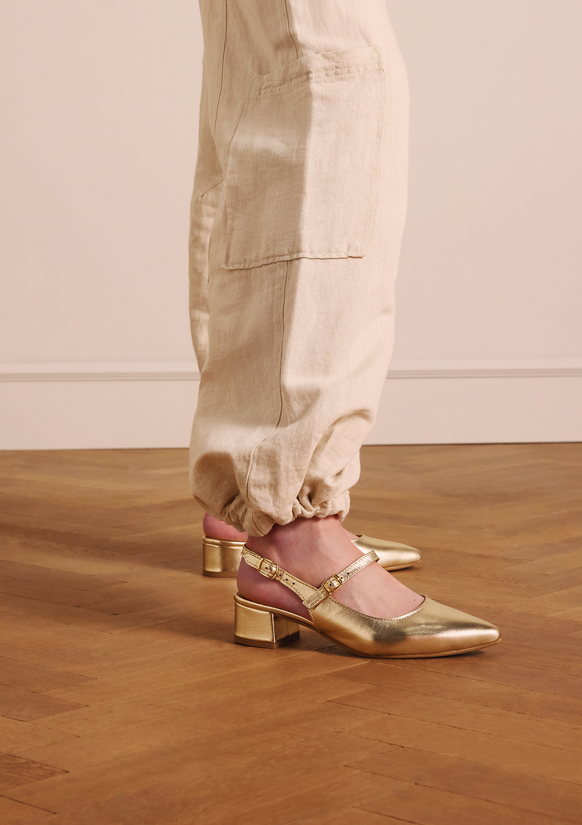 Gouden leren slingbacks