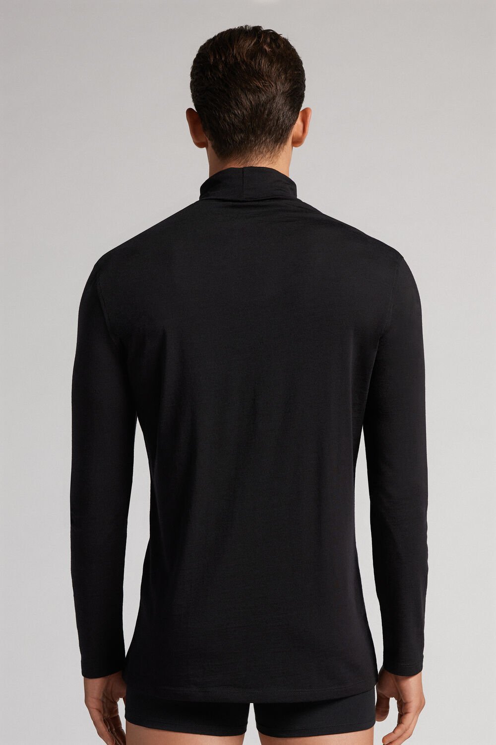 Blusa de lã merino de manga comprida e gola alta