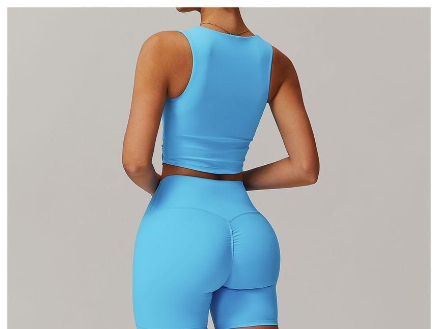 Skinniano - Sporttop met vierkante hals en effen crop top