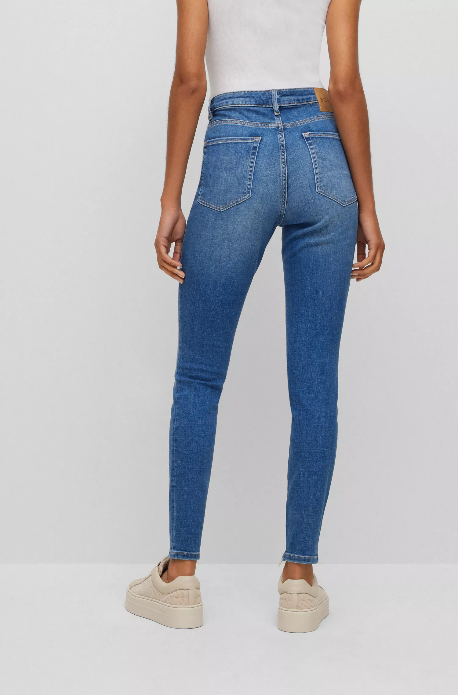 Calça jeans BOSS preta de cintura alta em denim super elástico azul