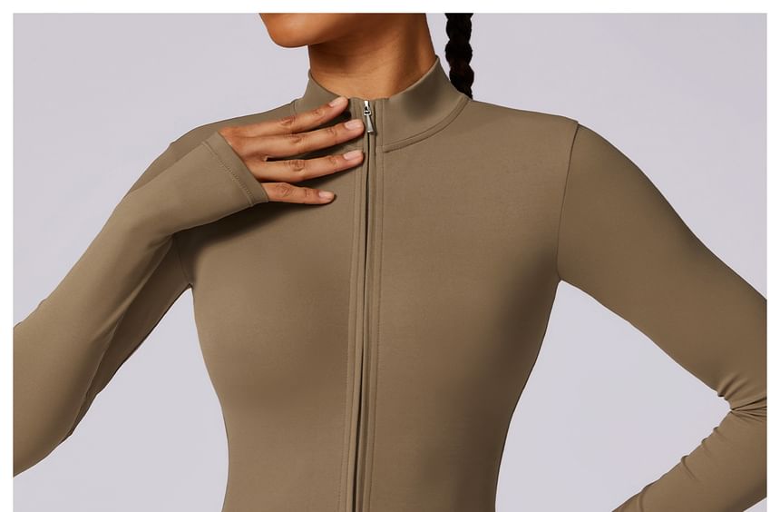 Skinniano - Sportjumpsuit met lange mouwen en halve rits