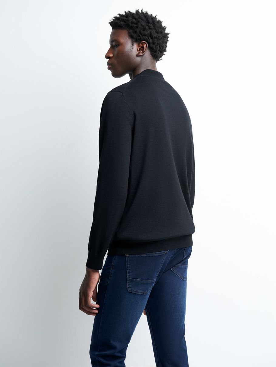 Pull col montant zippé en laine mérinos