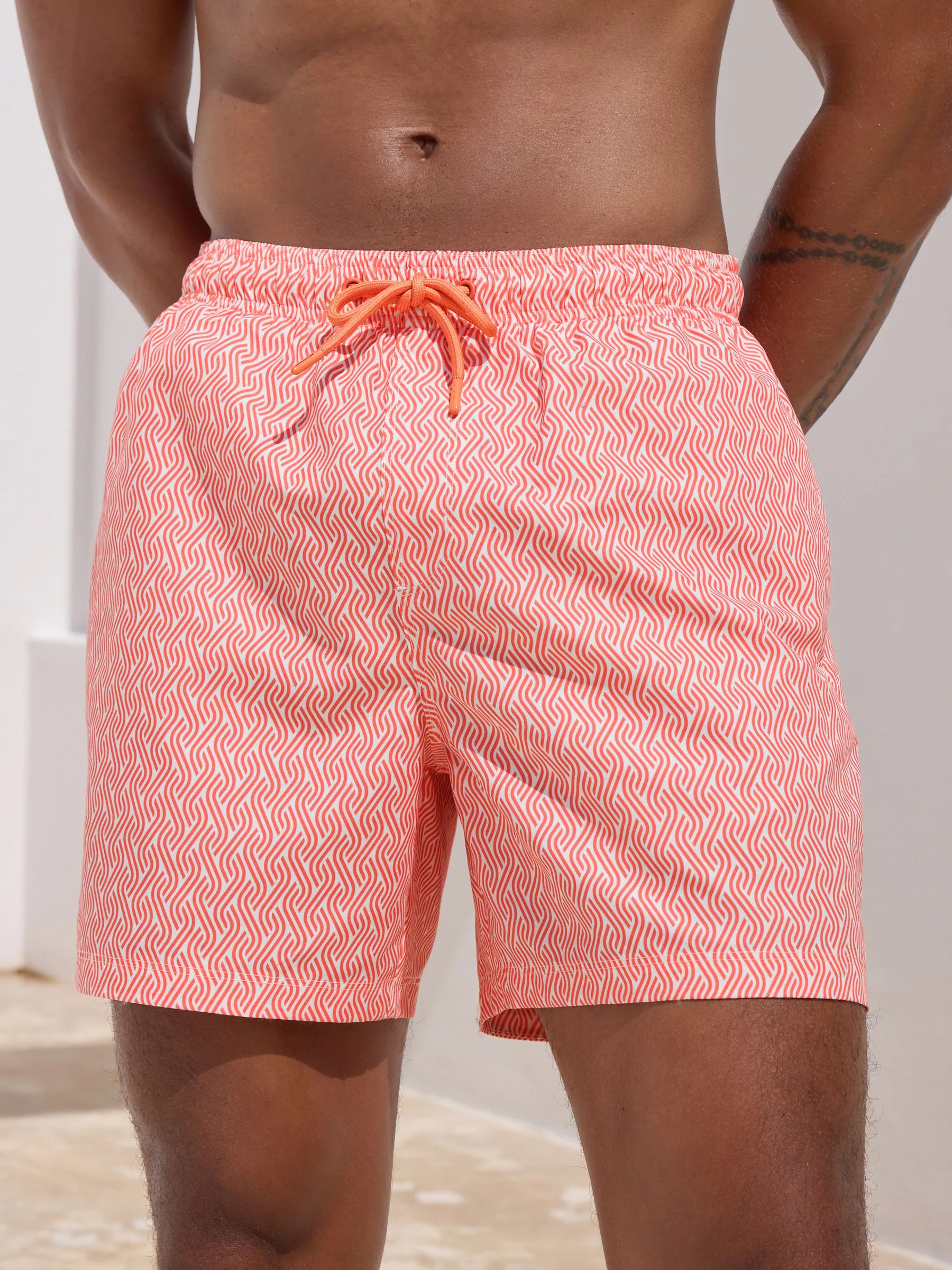 Helderblauw/koraal geometrisch - Geprinte zwemshorts 2 stuks
