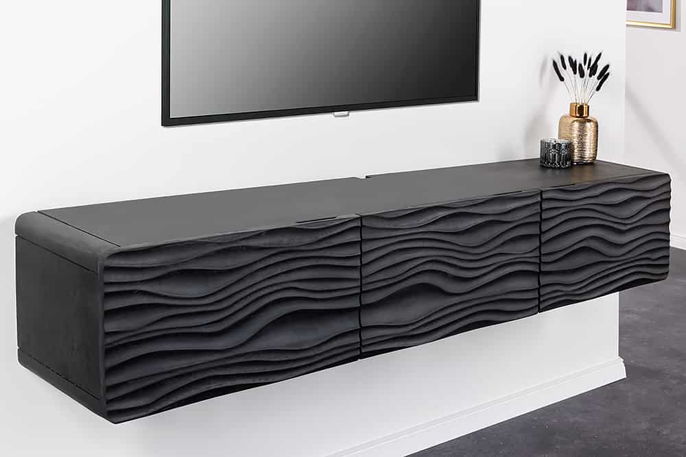 Design TV-Board WAVE 160cm schwarz Mangoholz mit 3D Schnitzereien hängend