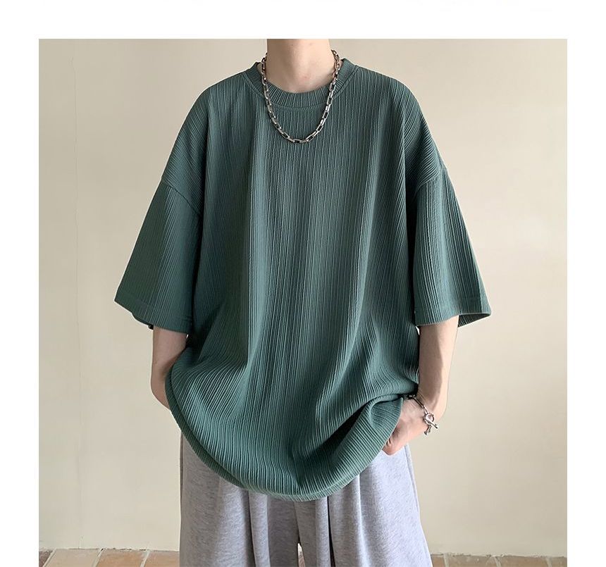 Nightbell - Effen oversized T-shirt met ronde hals en elleboogmouwen