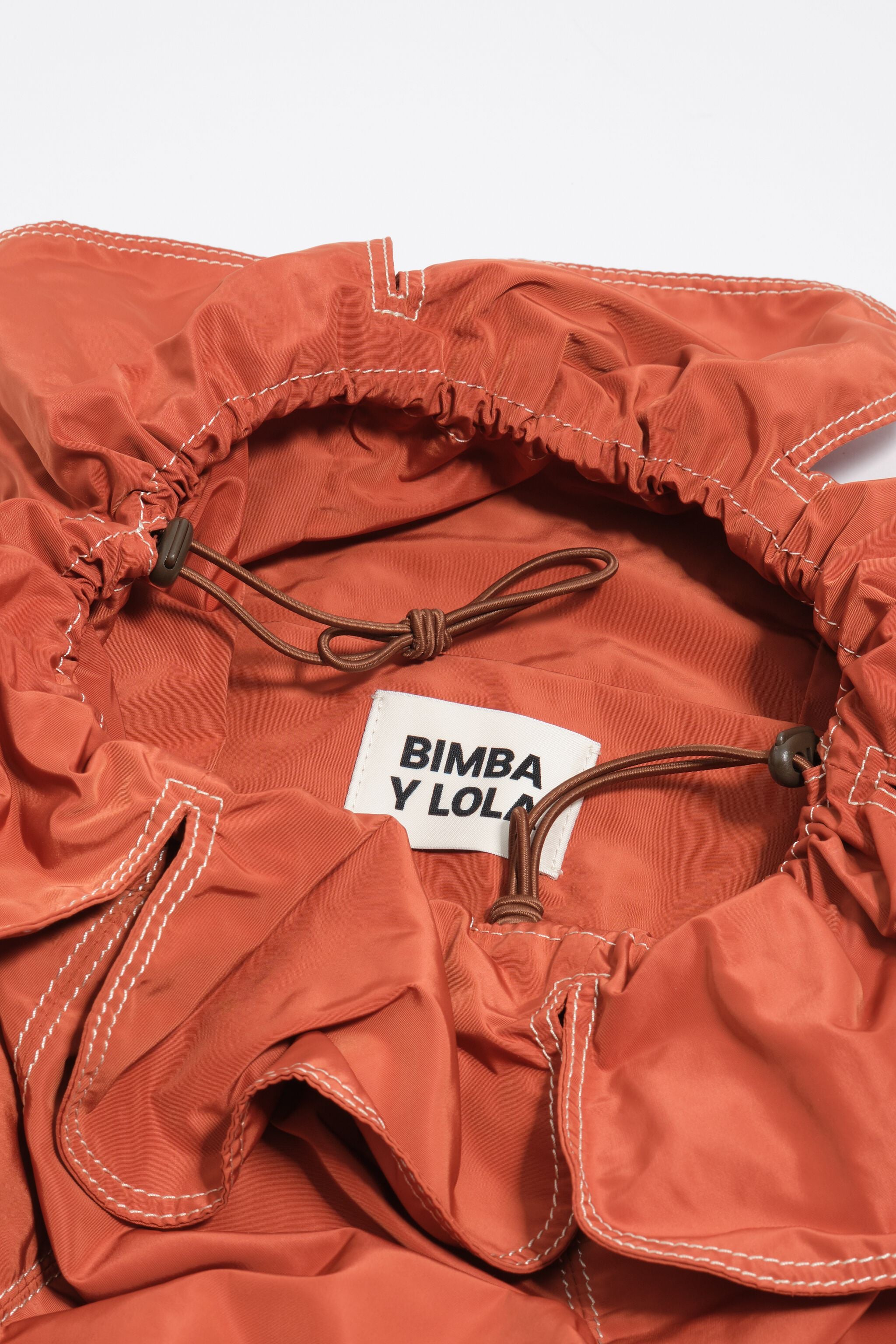 Bolsa Pétalo grande em tecido laranja queimado