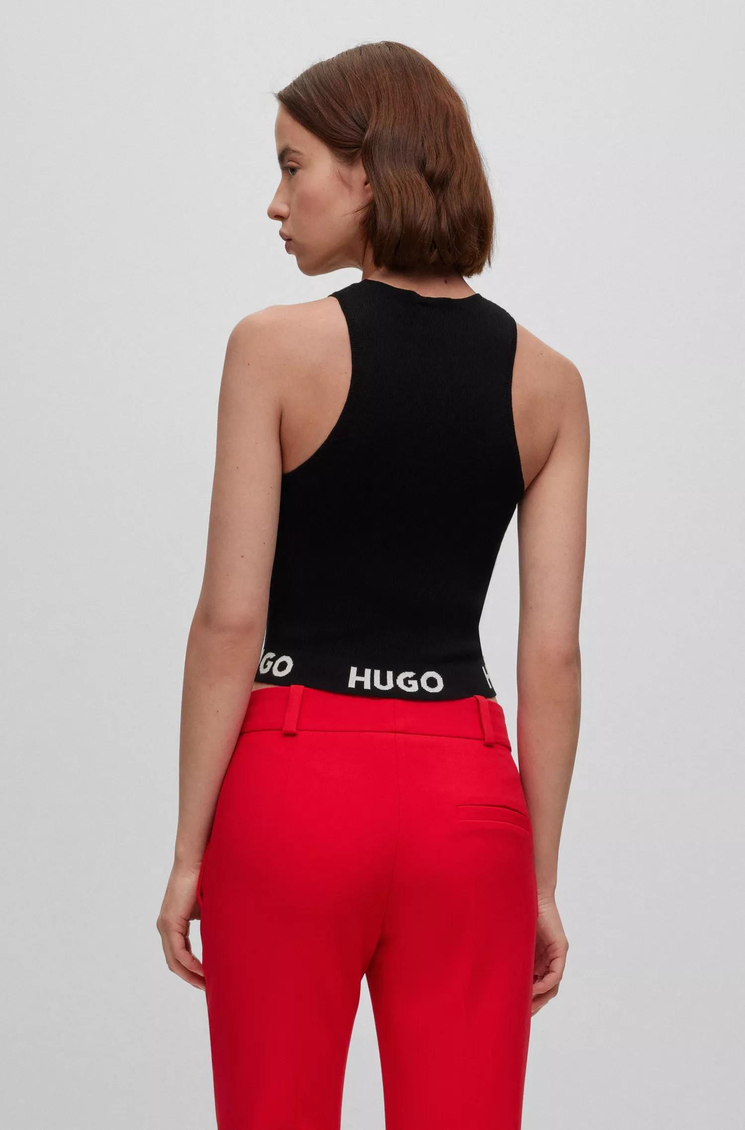 Blusa HUGO vermelha sem mangas em malha canelada com cós em jacquard com o logotipo.