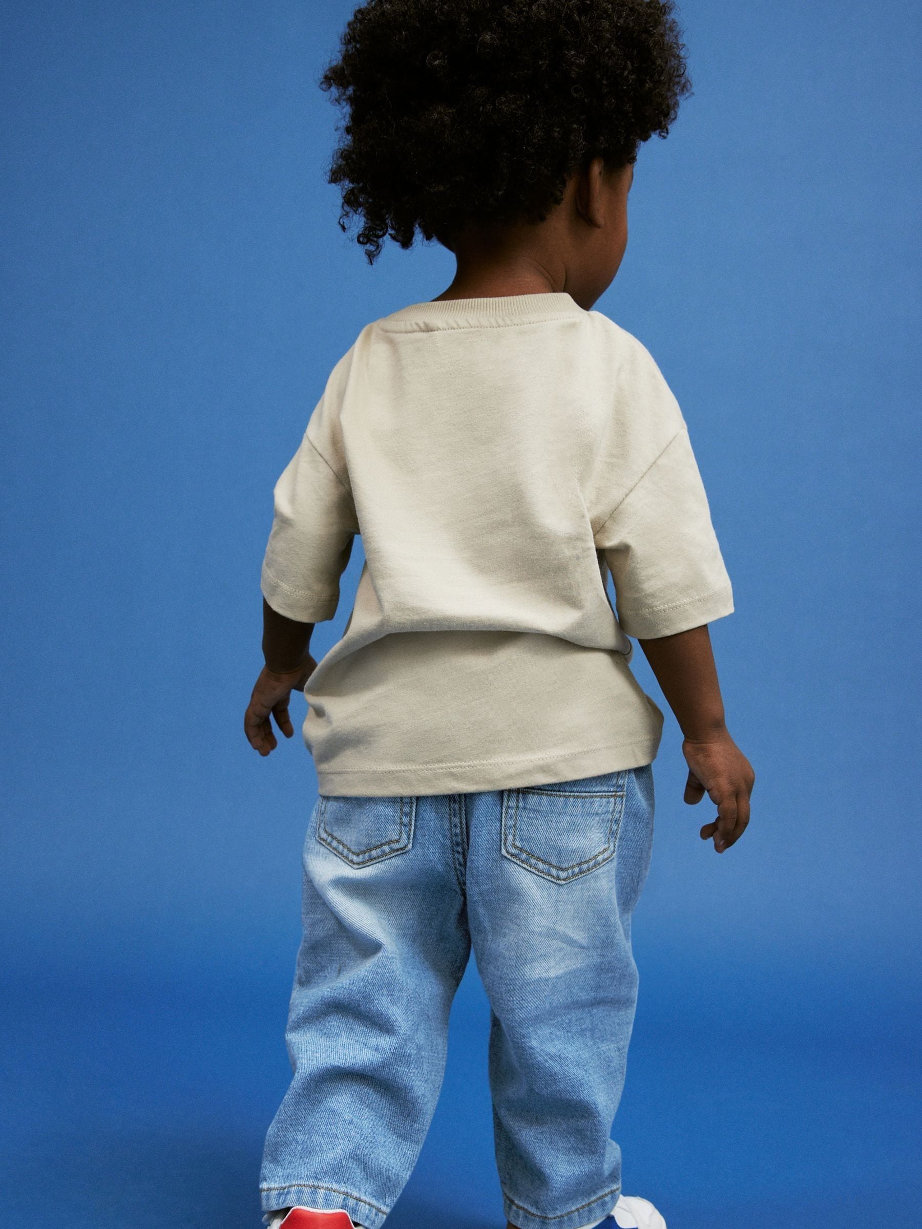 Lichtblauwe denim - Jeans met geplooide voorkant (3mnd-7jr)