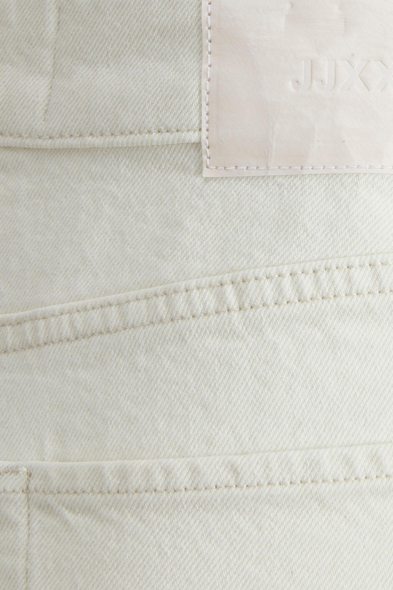 calça jeans branca justa