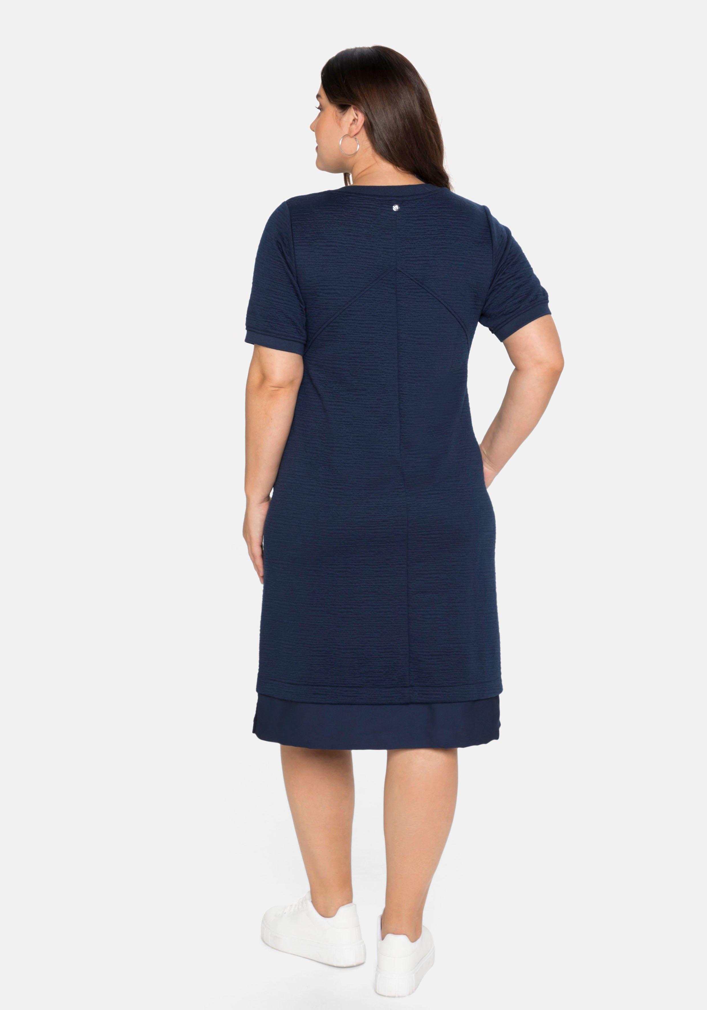 Sweatkleid mit Satineinsatz am Saum