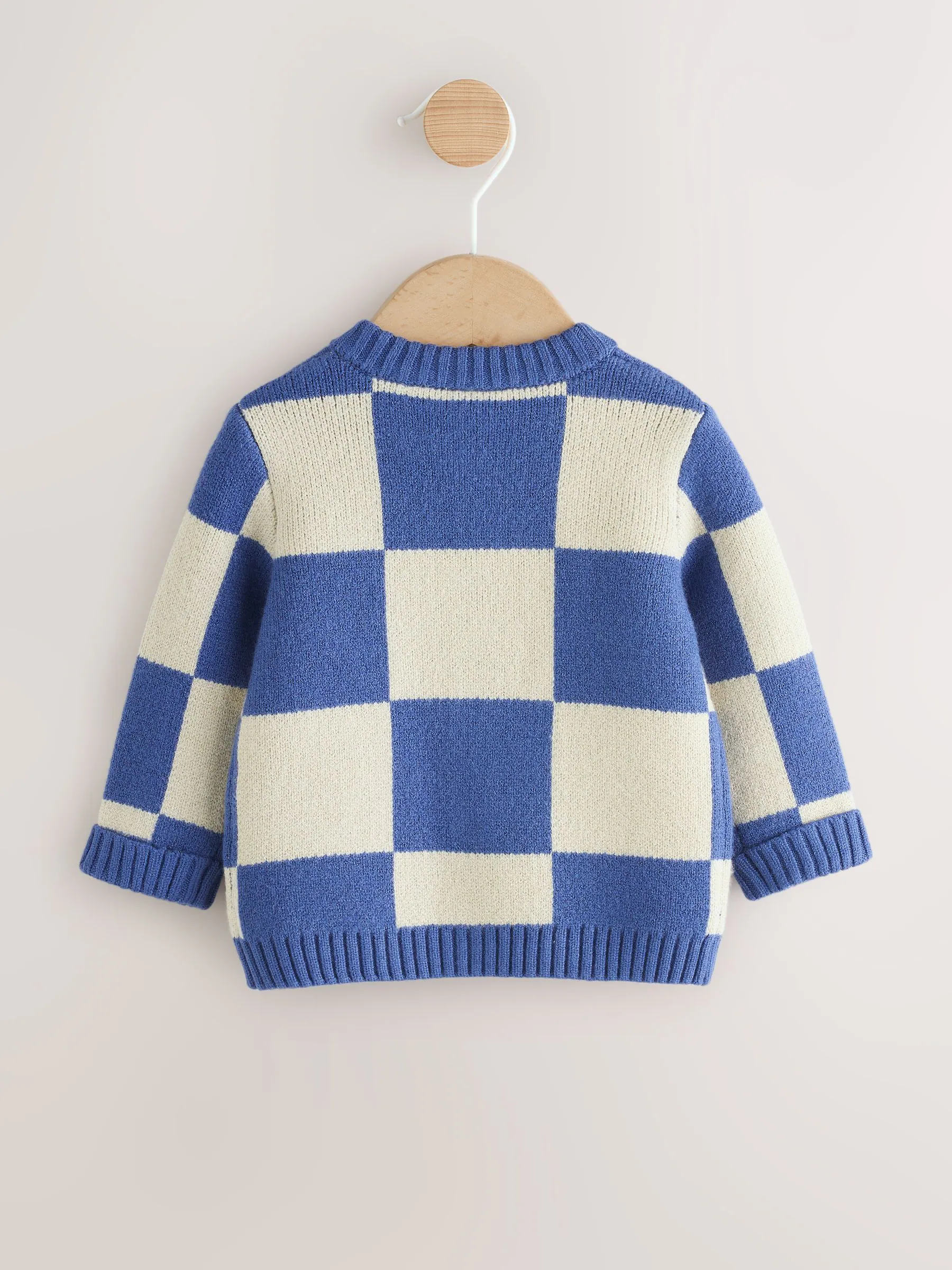 Blauw geborduurd dambord Karakter - Gebreid babyvest (0 mnd- 2 jr)