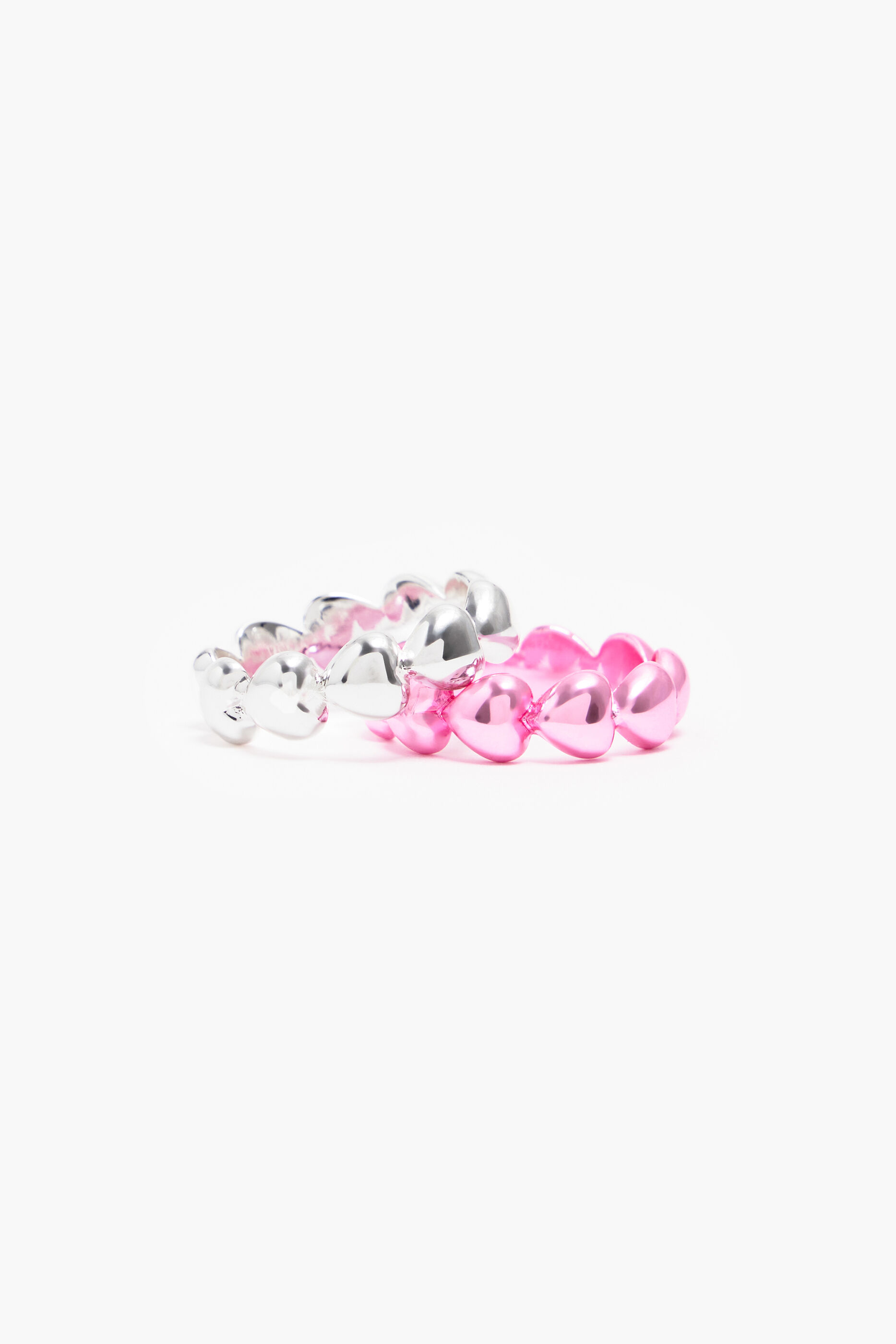 Conjunto de anéis em formato de coração rosa
