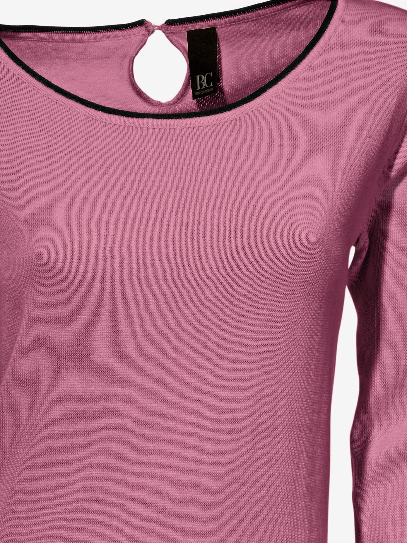 Pull long look tendance avec découpes au dos