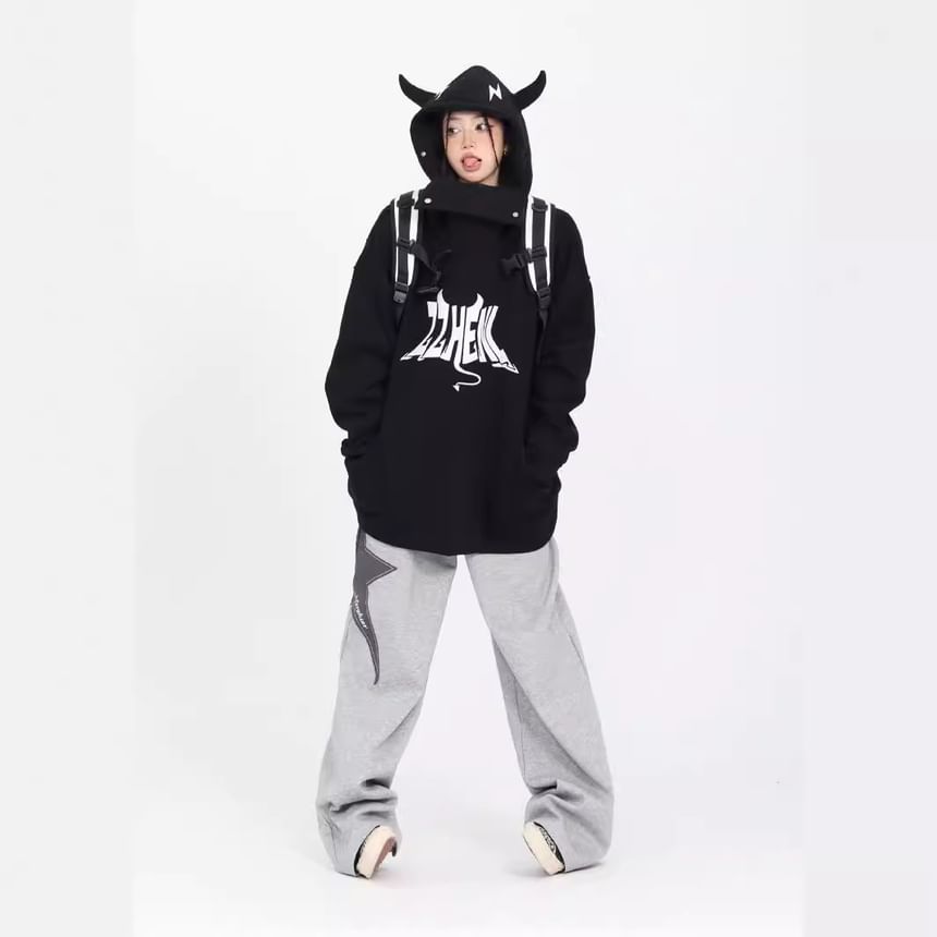 Rosesand - Lage taille, wijde joggingbroek met sterrenprint en losse pasvorm