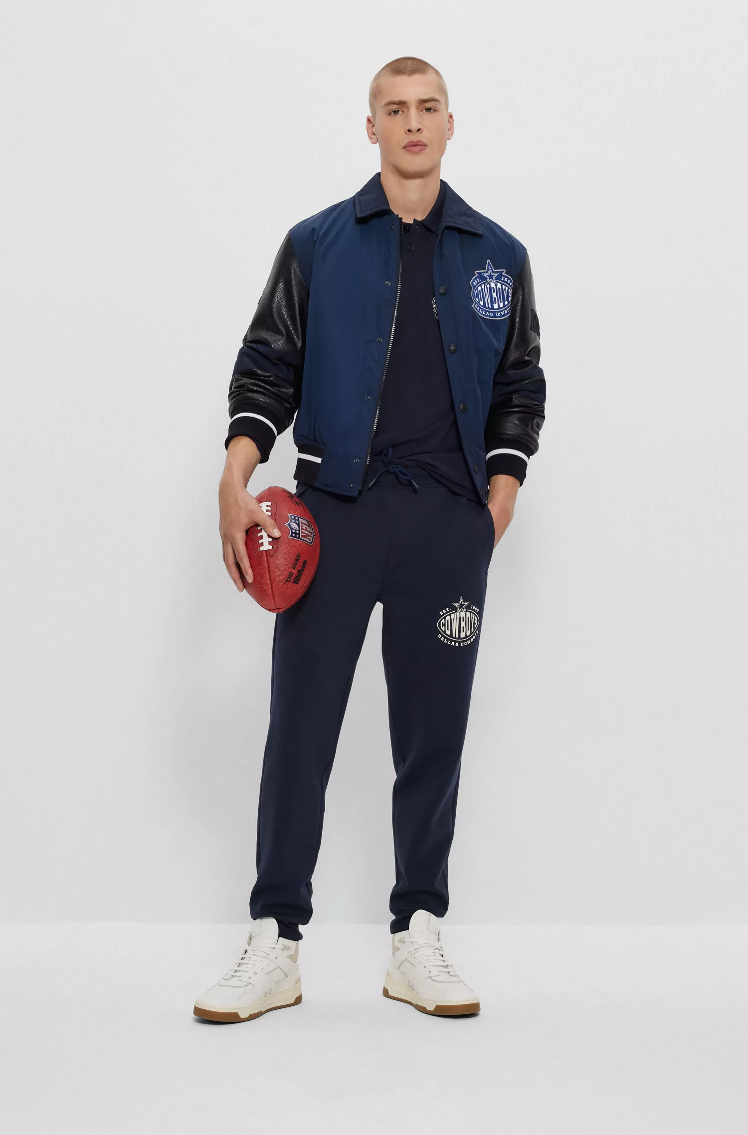 Camisa polo de manga comprida BOSS Orange-BOSS x NFL com estampa da colaboração.