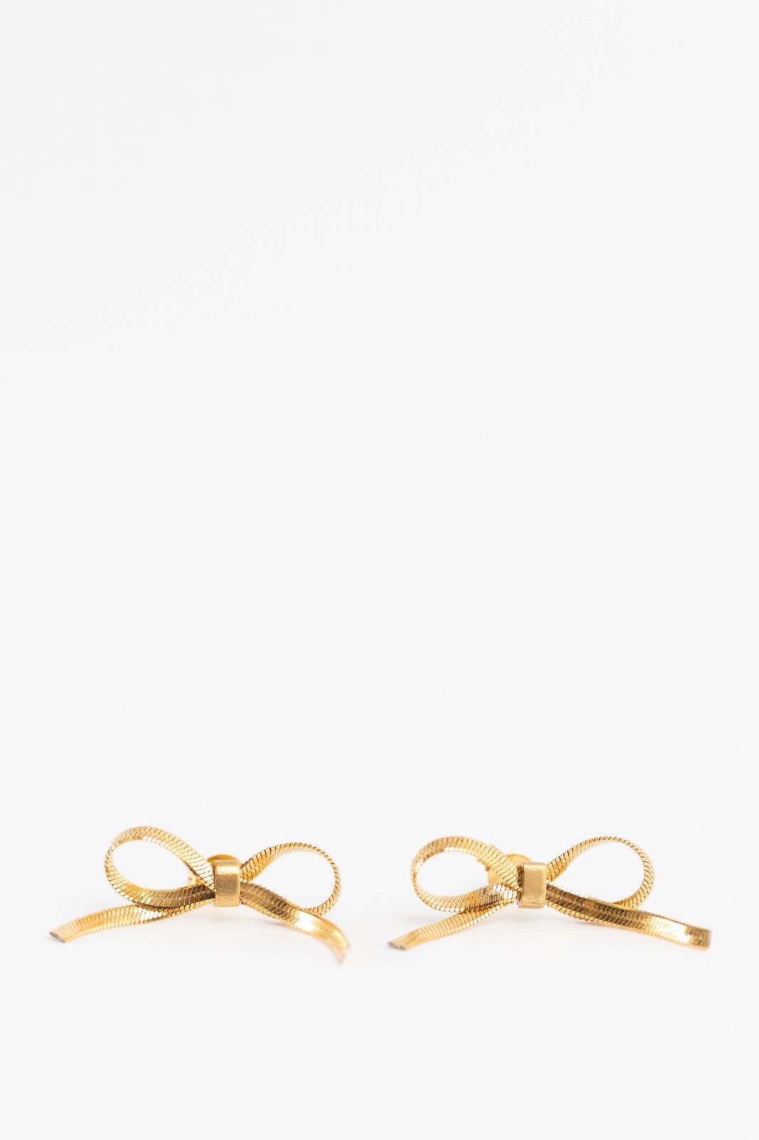 Gold plated stud oorbellen met strikjes