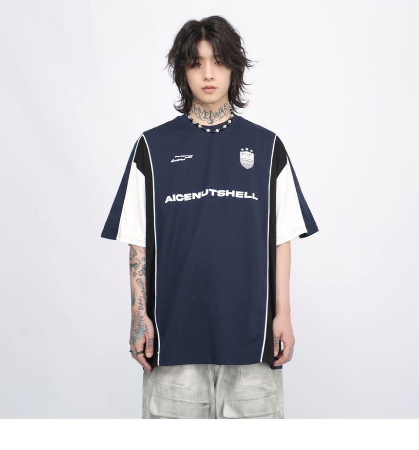 Derbundy - T-shirt met ronde hals, elleboogmouwen en letters in kleurblokken