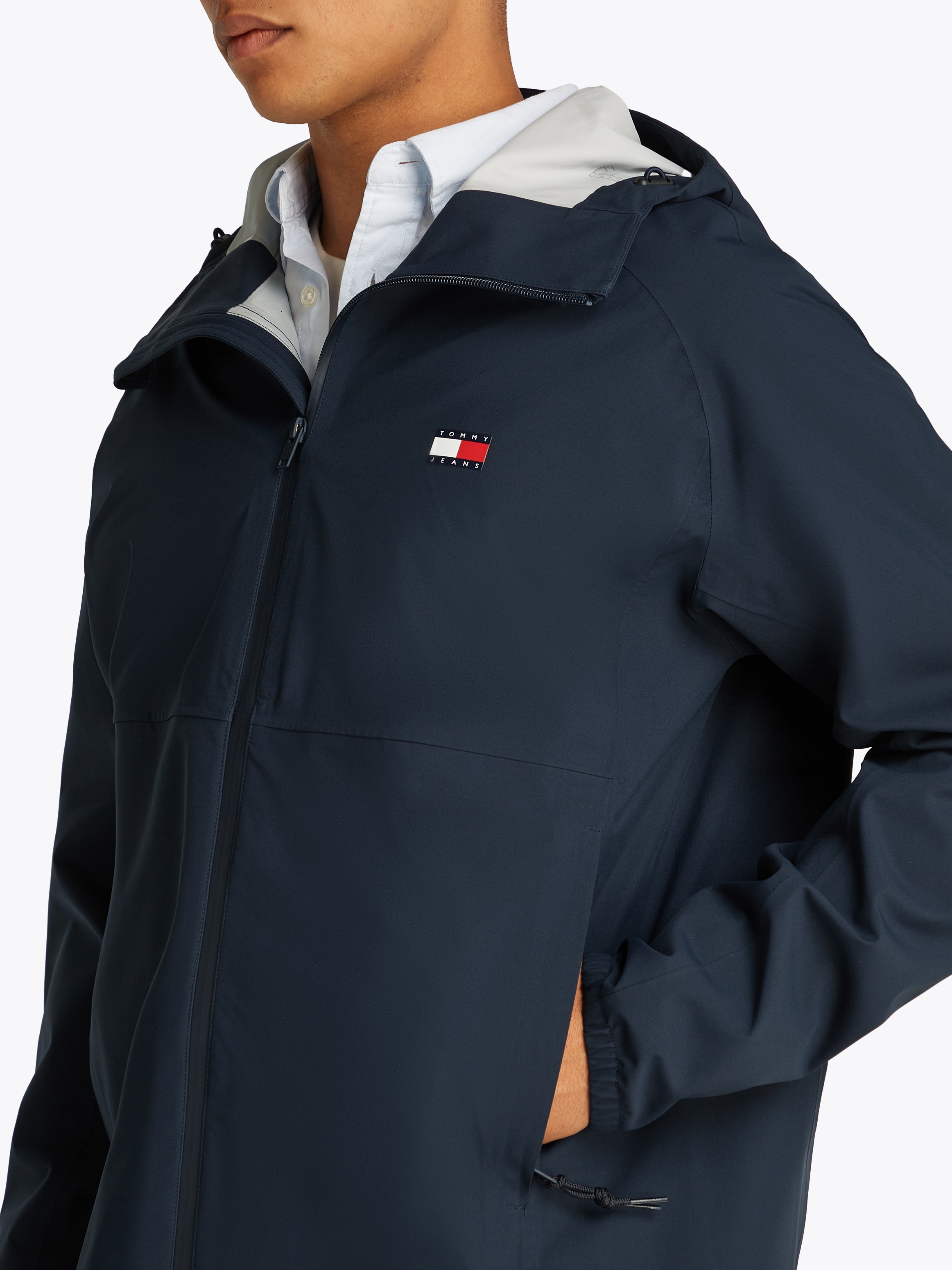 Tommy Jeans Blouson »TJM TECH WINDBREAKER« mit Kapuze