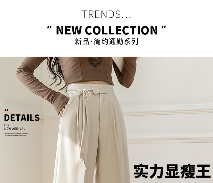 Odestra - Hoge taille effen pantalon met wijde pijpen en zelfstrik