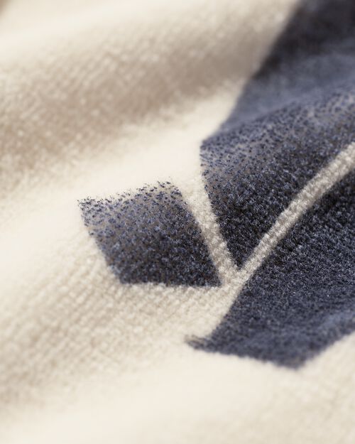 pull en tissu éponge dino pour bébé écru