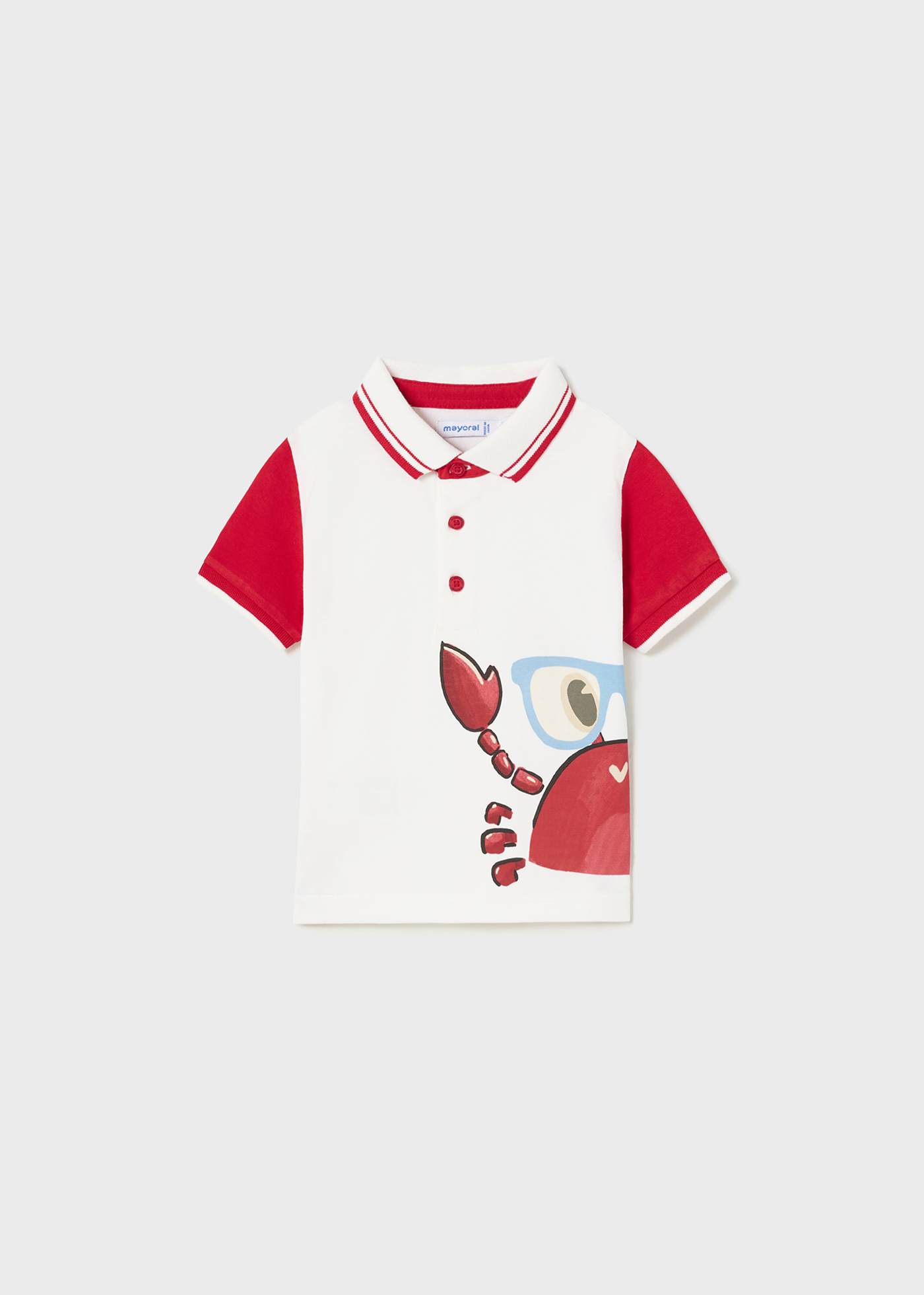 Camisa polo lisa de malha para bebê, feita de algodão sustentável.