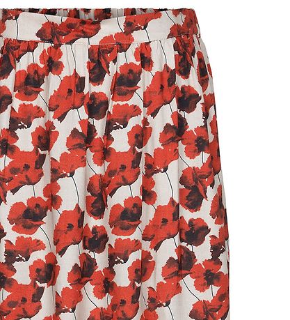Cost:Bart Rock - Kenya - Valient Poppy m. Blumen