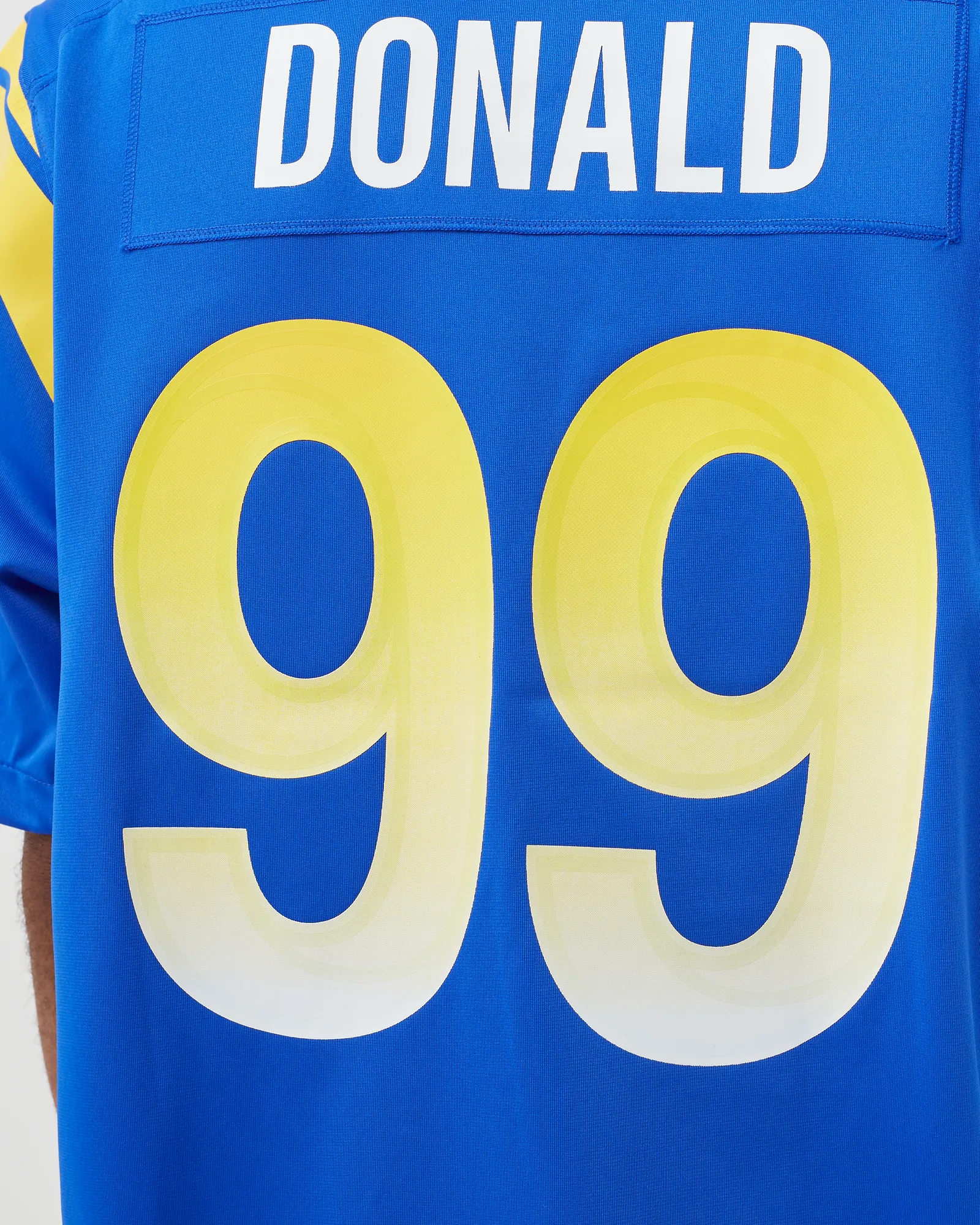 Camisa oficial Nike NFL Los Angeles Rams Aaron Donald 99 para jogos em casa