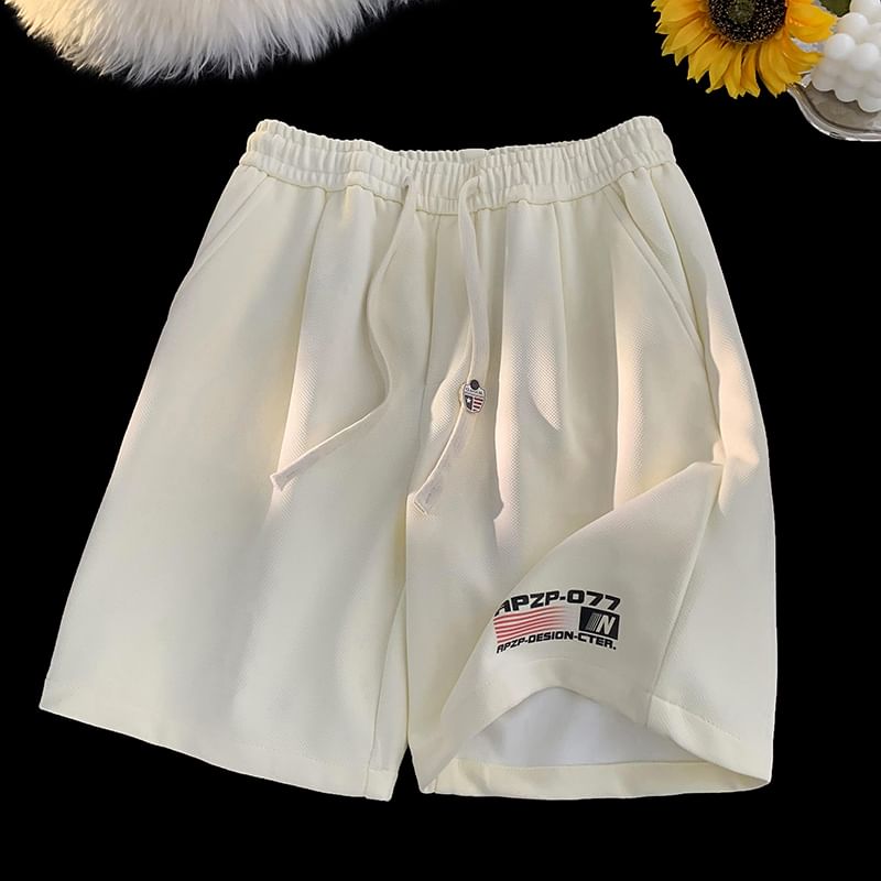 Kimeya - Zweetshorts met trekkoord in de taille, letters en nummers